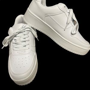 Plataform sneakers with memory foam. Worn only inside to try them on. Like new!